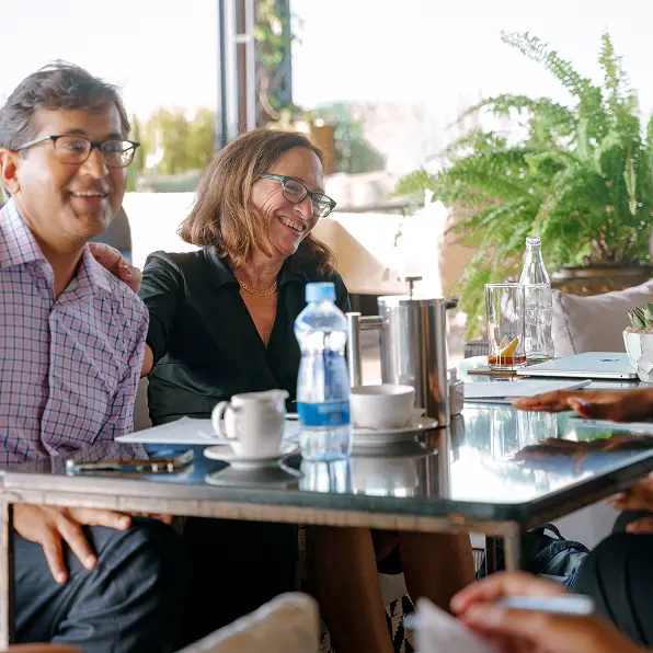 Kuramo Foundation team members working on financial inclusion projects in Africa